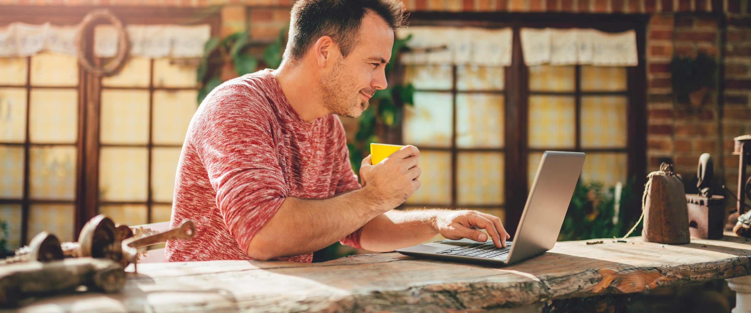 Man working outdoors with exotic background.