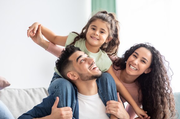 Young Latino family of three.