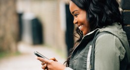 African-American Girl using Mobile Phone