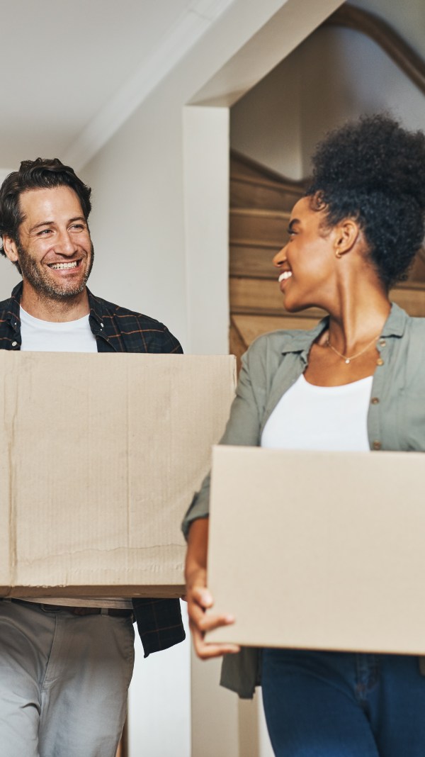 Couple moving into a house.