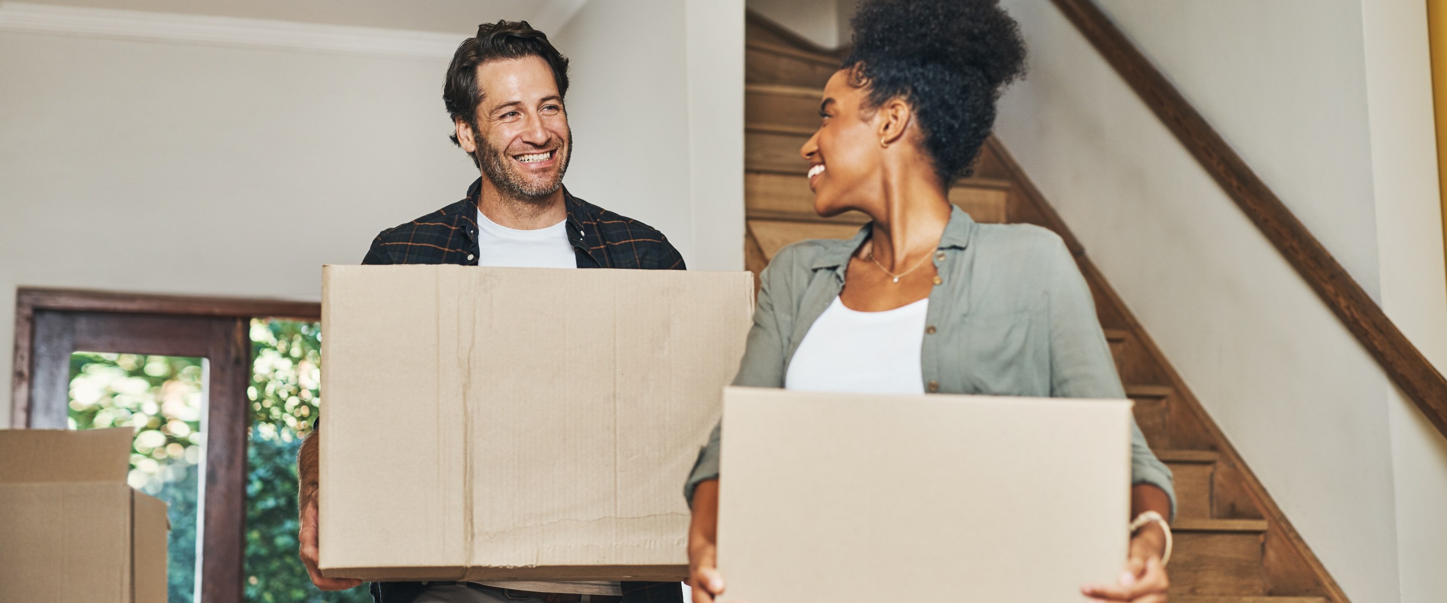 Couple moving into a house.