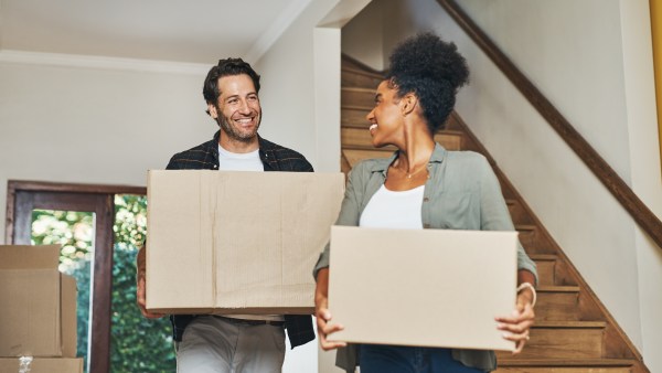 Couple moving into a house.