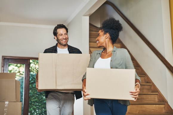 Couple moving into a house.