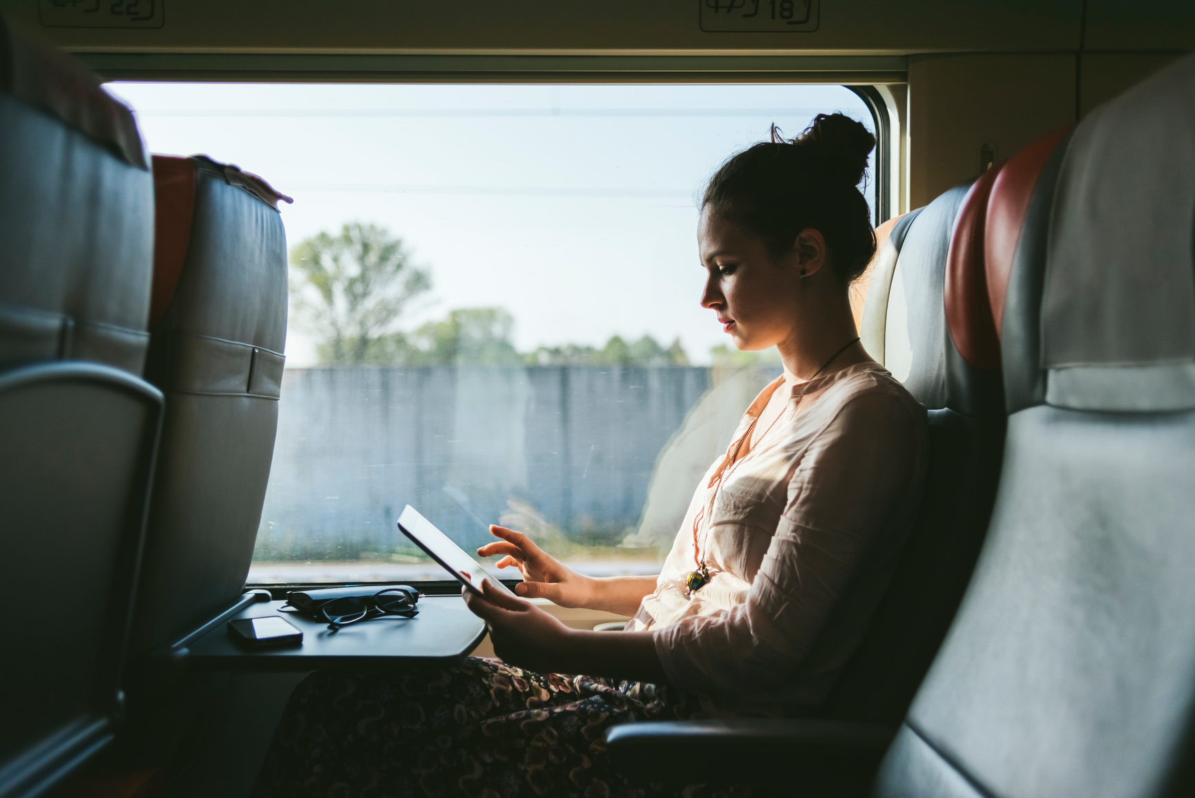 Рабочий стиль на удаленке. In a Train in a Sweater. Commuters are.