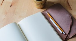 A healthier approach to the writer's life: black coffee, pencil, e-cigarette and a blank page.