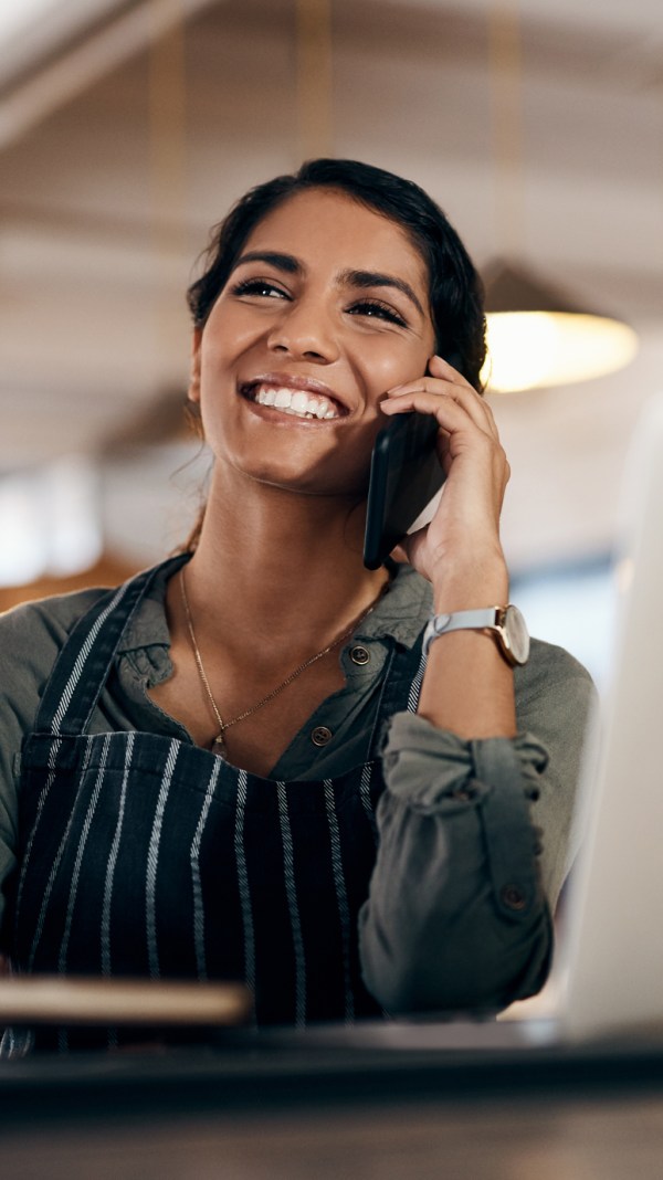 How To Fill Out A 1099 Form: Everything Business Owners Need To Know 3 Self-employed person on the phone
