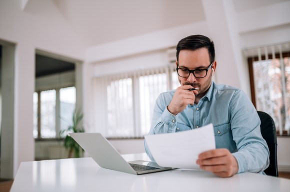 Man looking at a document