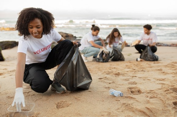 Volunteers cleaning up the beach.