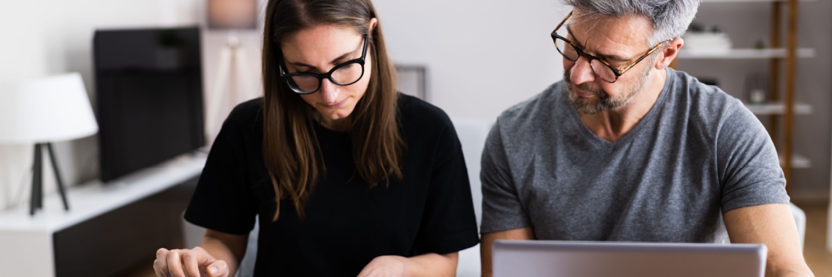 Couple Doing Taxes On Computer