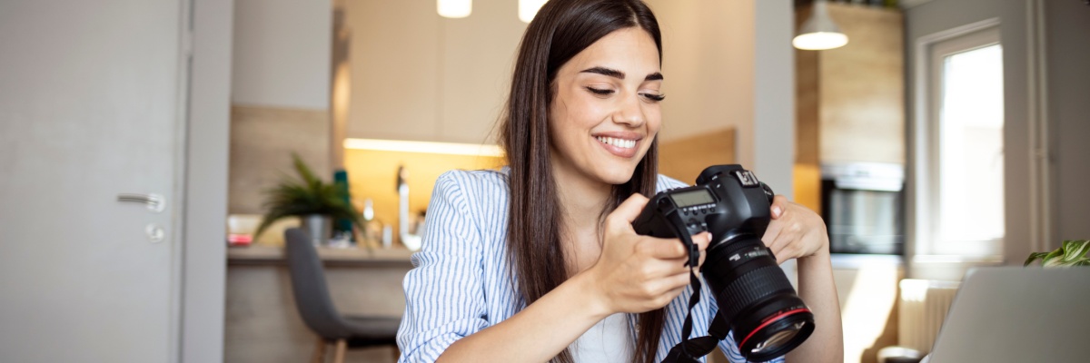 Female photographer working at her desk