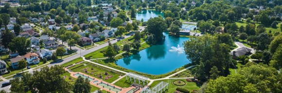 Aerial Lakeside Park gardens and fountains with distant downtown Fort Wayne, Indiana