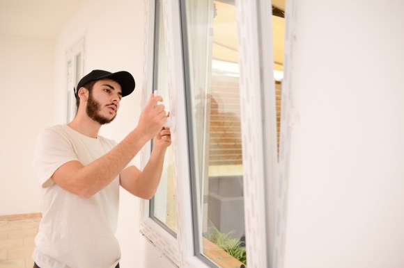 Man installing energy efficient windows